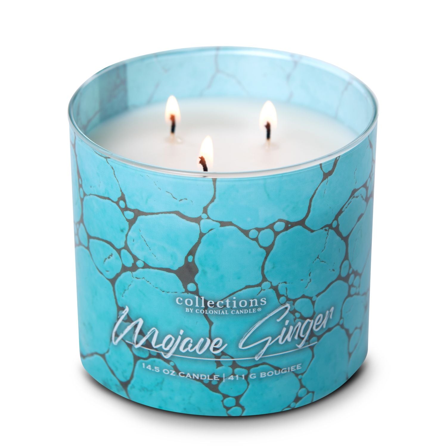KAAARS.NL - Colonial Candle -%product_title - 28,95 - Soja geurkaars in glazen pot met goudkleurige deksel. Afbeelding van blauwe turkoois uit de woestijn. Geurtonen van patchouli, musk, bergamot,bloemen, gember en citrus. Brandende kaars
